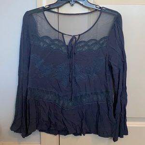 boutique top with lace/mesh detailing